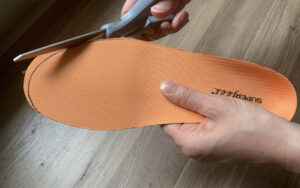 Step 3 of how to trim your insoles in 4 simple steps; Trim the insole along the line you have marked